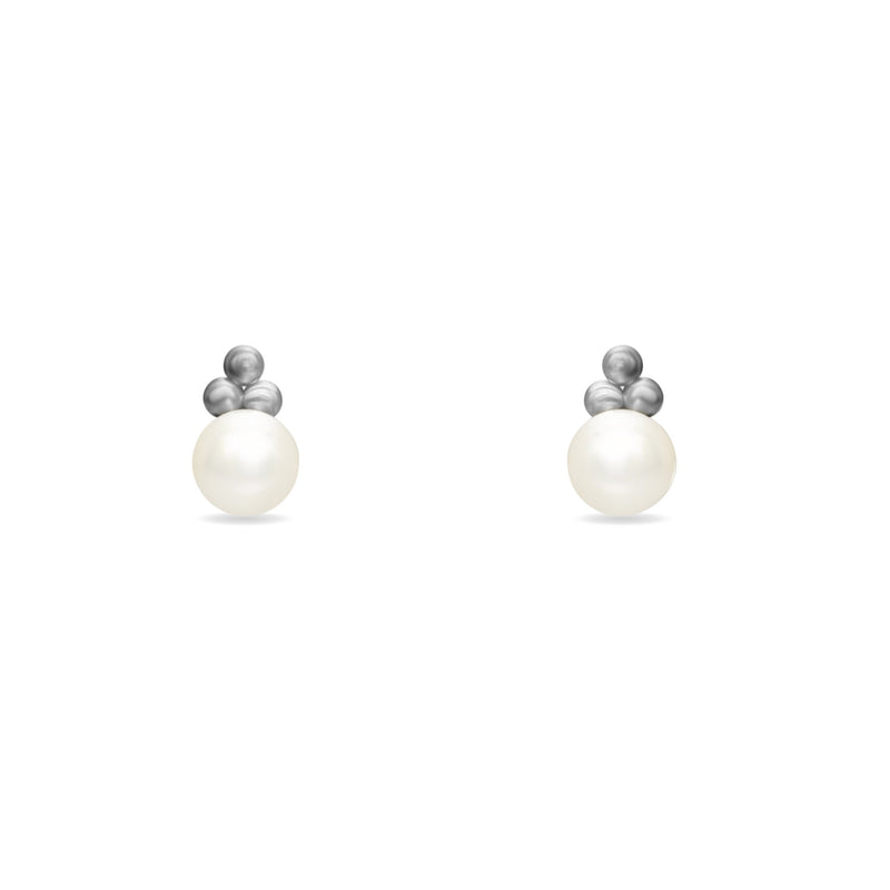 Are you the girl with a pearl earring? If so, this 14 karat gold earring is made for you.