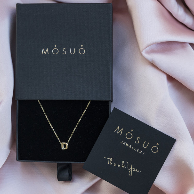 A 18 karat gold vermeil necklace with your initial letter "D". This diamond letter necklace is a special jewelry necklace that can be worn day and night. A genuine diamond stone in the corner of the letter makes this gold diamond necklace a luxury and ideal gift for yourself, your best friend or loved one. 