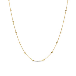 This ball chain necklace in 14 karat gold features petit balls aligned along the gold chain. Wear it by itself or combine with other gold necklaces for the ultimate layering look.