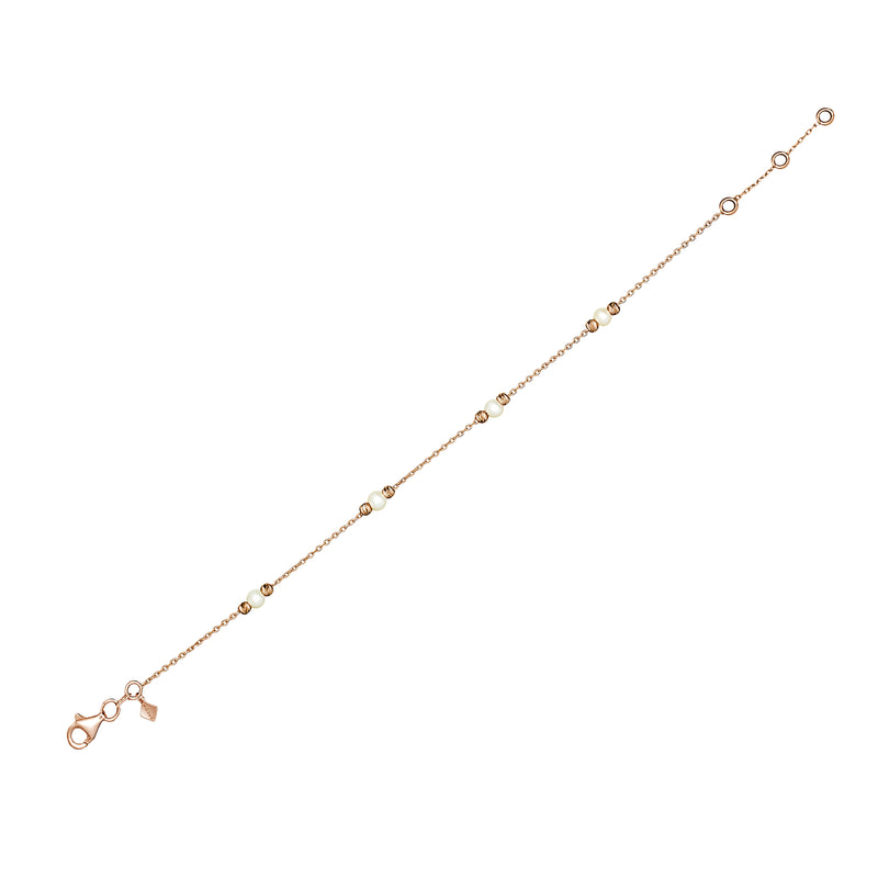 Rose Gold. This handmade 14 karat gold pearl bracelet is an essential classic for every day. Each freshwater pearl is encased by diamond cut gold balls that reflect the light and add an extra sparkle to your wrist. 