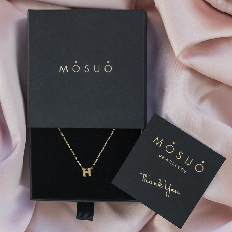 A 18 karat gold vermeil necklace with your initial letter "H". This diamond letter necklace is a special jewelry necklace that can be worn day and night. A genuine diamond stone in the corner of the letter makes this gold diamond necklace a luxury and ideal gift for yourself, your best friend or loved one