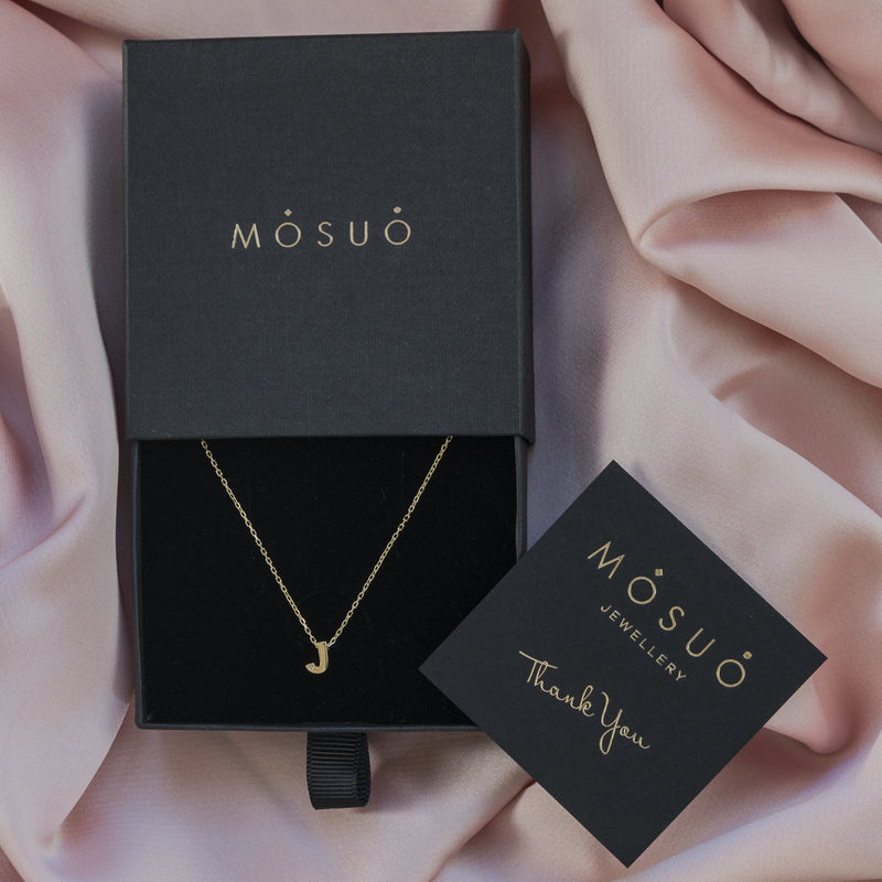 A 18 karat gold vermeil necklace with your initial letter "J". This diamond letter necklace is a special jewelry necklace that can be worn day and night. A genuine diamond stone in the corner of the letter makes this gold diamond necklace a luxury and ideal gift for yourself, your best friend or loved one. 