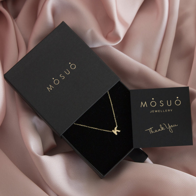 A 18 karat gold vermeil necklace with your initial letter "K". This diamond letter necklace is a special jewelry necklace that can be worn day and night. A genuine diamond stone in the corner of the letter makes this gold diamond necklace a luxury and ideal gift for yourself, your best friend or loved one. 
