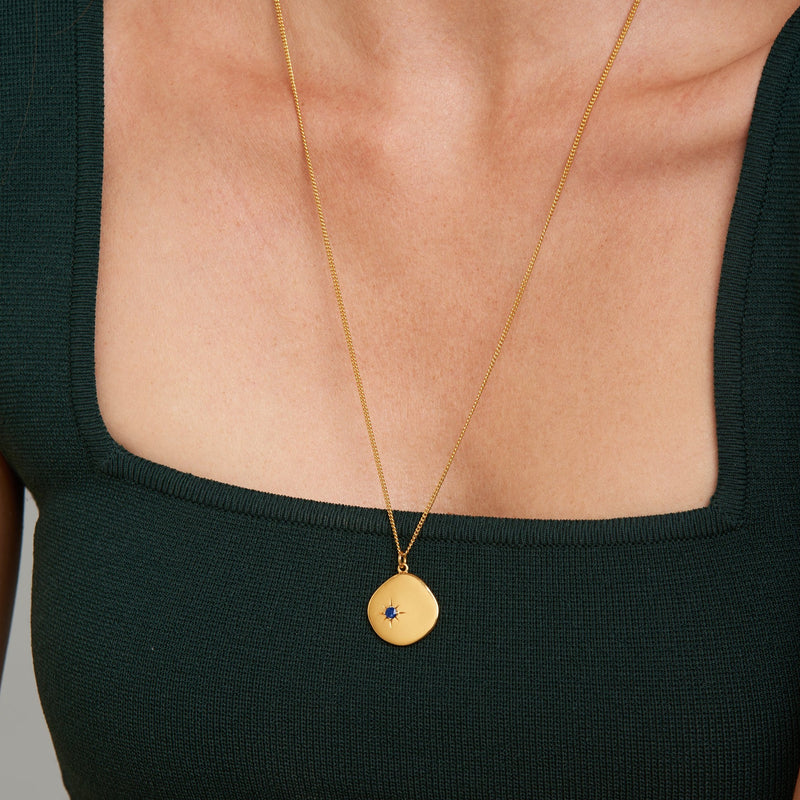 A new universe. The 18 Karat Gold Vermeil Birthstone Necklace shines with its lapis lazuli and long-lasting quality. Wear it as a symbol of your birth month September. This gold necklace is a perfect match for your everyday look. The long chain makes this necklace a perfect layering piece for a vibrant and extravagant look. Lapis Lazuli, the September Birthstone is known as a symbol of truth and wisdom.