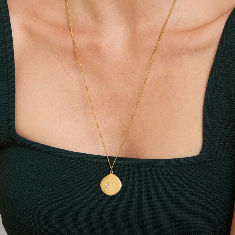 A new universe. The 18 Karat Gold Vermeil Birthstone Necklace shines with its  moonstone and long-lasting quality. Wear it as a symbol of your birth month June. This gold necklace is a perfect match for your everyday look. The long chain makes this necklace a perfect layering piece for a vibrant and extravagant look. Moonstone, the June Birthstone represents changes and new beginnings. This mystical gemstone is inspiring intuition, harmony, and confidence in us.