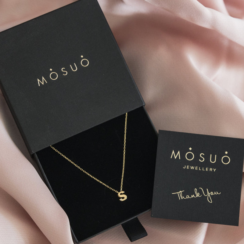 A 18 karat gold vermeil necklace with your initial letter "S". This diamond letter necklace is a special gold necklace that can be worn day and night. A genuine diamond stone in the corner of the letter makes this gold diamond necklace a luxury and ideal gift for yourself, your best friend or loved one. 