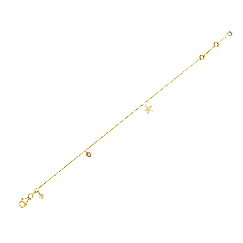 On the shore or under the water, our Seastar Anklet with a bezel - set zirconia stone is a must - have for every beach babe.   The 14 karat gold anklet with its seastar charm and colorful stone adds a touch of sparkle to every step you take. 