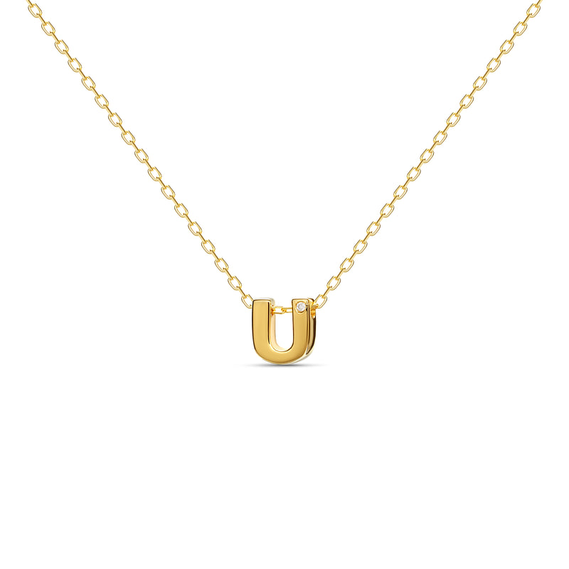 A 18 karat gold vermeil necklace with your initial letter "U". This diamond letter necklace is a special gold necklace that can be worn day and night. A genuine diamond stone in the corner of the letter makes this gold diamond necklace a luxury and ideal gift for yourself, your best friend or loved one. 