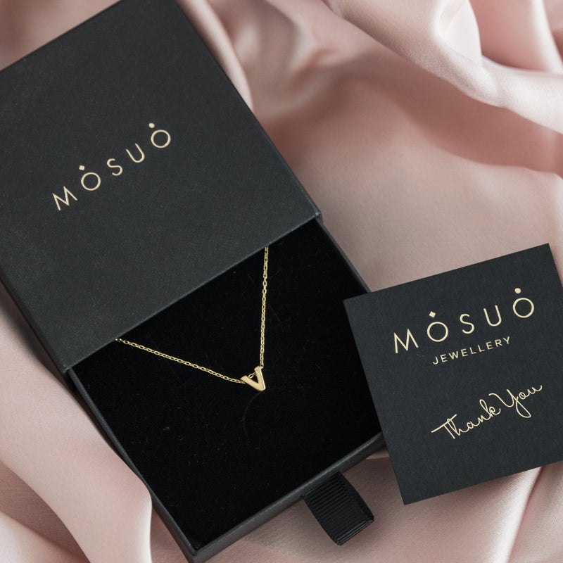 A 18 karat gold vermeil necklace with your initial letter "V". This diamond letter necklace is a special gold necklace that can be worn day and night. A genuine diamond stone in the corner of the letter makes this gold diamond necklace a luxury and ideal gift for yourself, your best friend or loved one. 