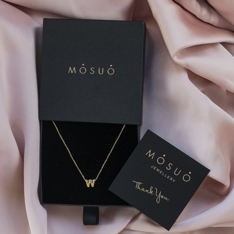 A 18 karat gold vermeil necklace with your initial letter "W". This diamond letter necklace is a special gold necklace that can be worn day and night. A genuine diamond stone in the corner of the letter makes this gold diamond necklace a luxury and ideal gift for yourself, your best friend or loved one. 