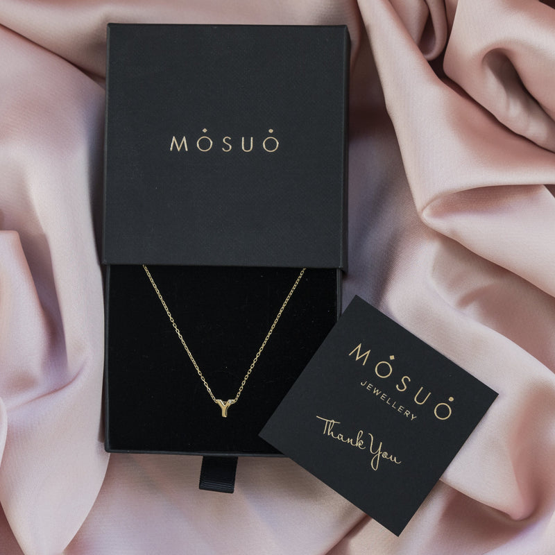 A 18 karat gold vermeil necklace with your initial letter "Y. This diamond letter necklace is a special gold necklace that can be worn day and night. A genuine diamond stone in the corner of the letter makes this gold diamond necklace a luxury and ideal gift for yourself, your best friend or loved one. 